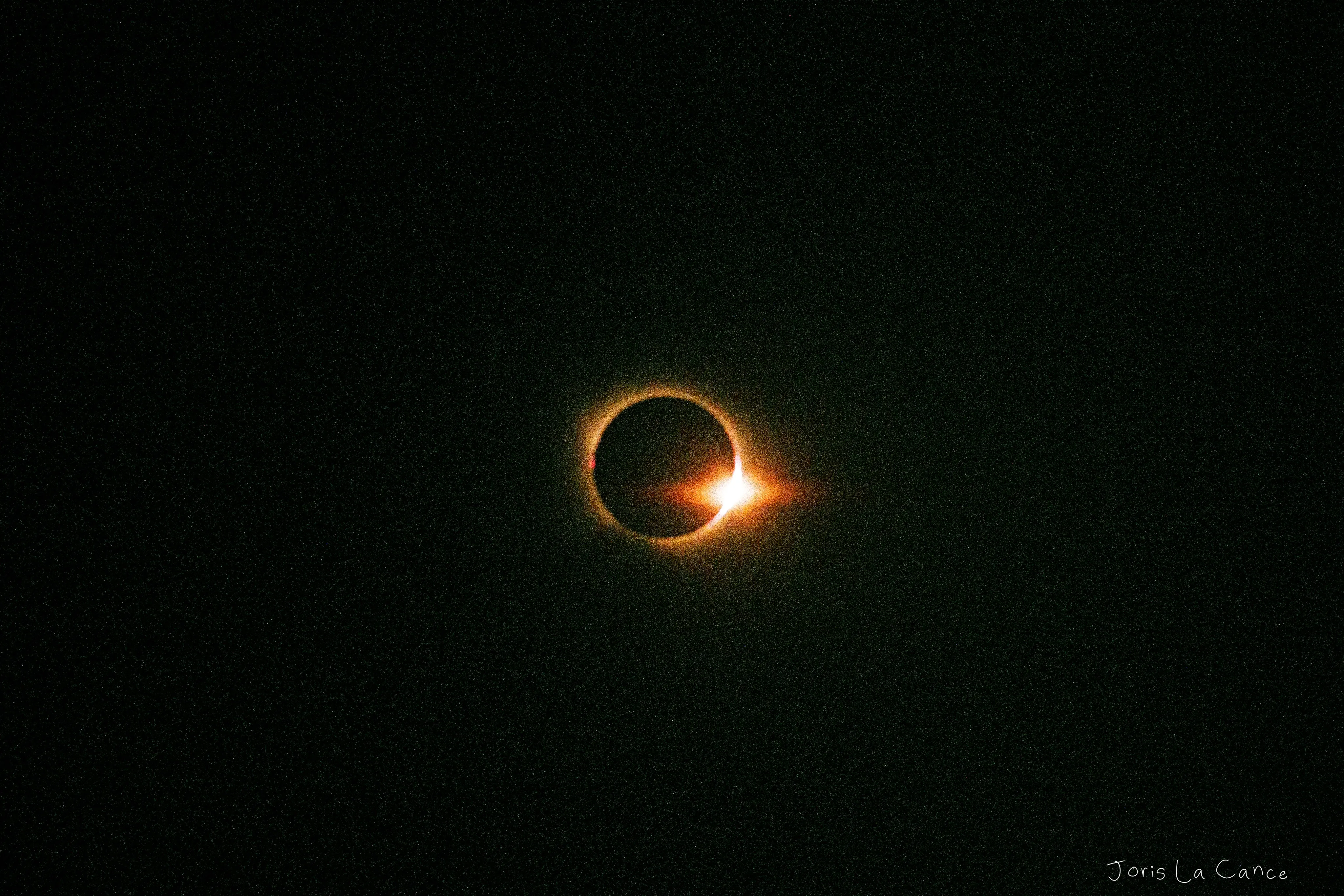 The diamond ring at the end of totality, a single point of sunlight on the moon's limb
